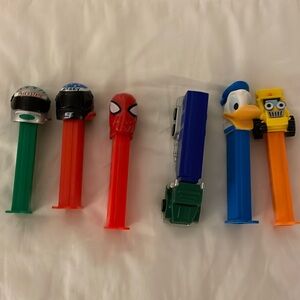 A variety of PEZ Dispensers - Spider-Man, Truck, Motorcycle, Donald Duck - 6